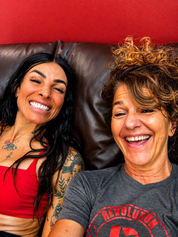 Coach and member at Revolution Fitness