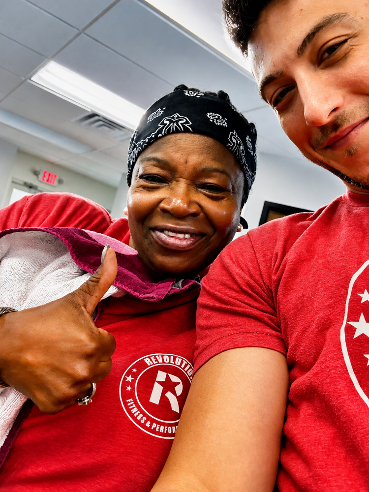 Members training together at Revolution Fitness