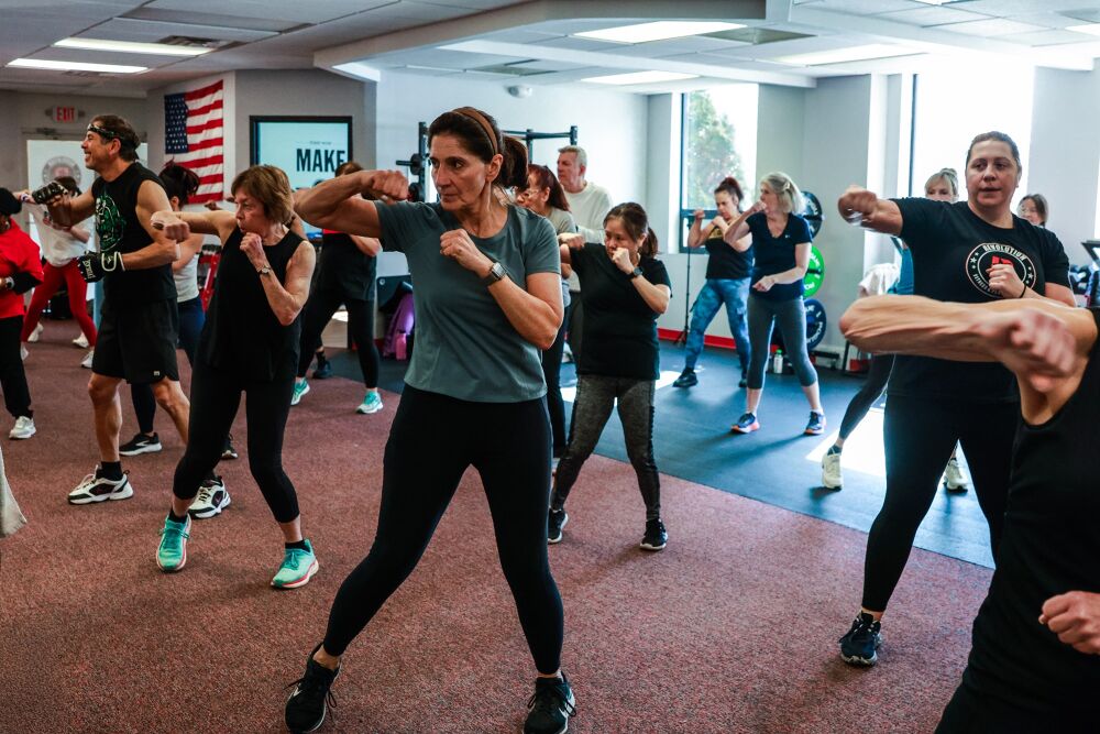 Members training together at Revolution Fitness